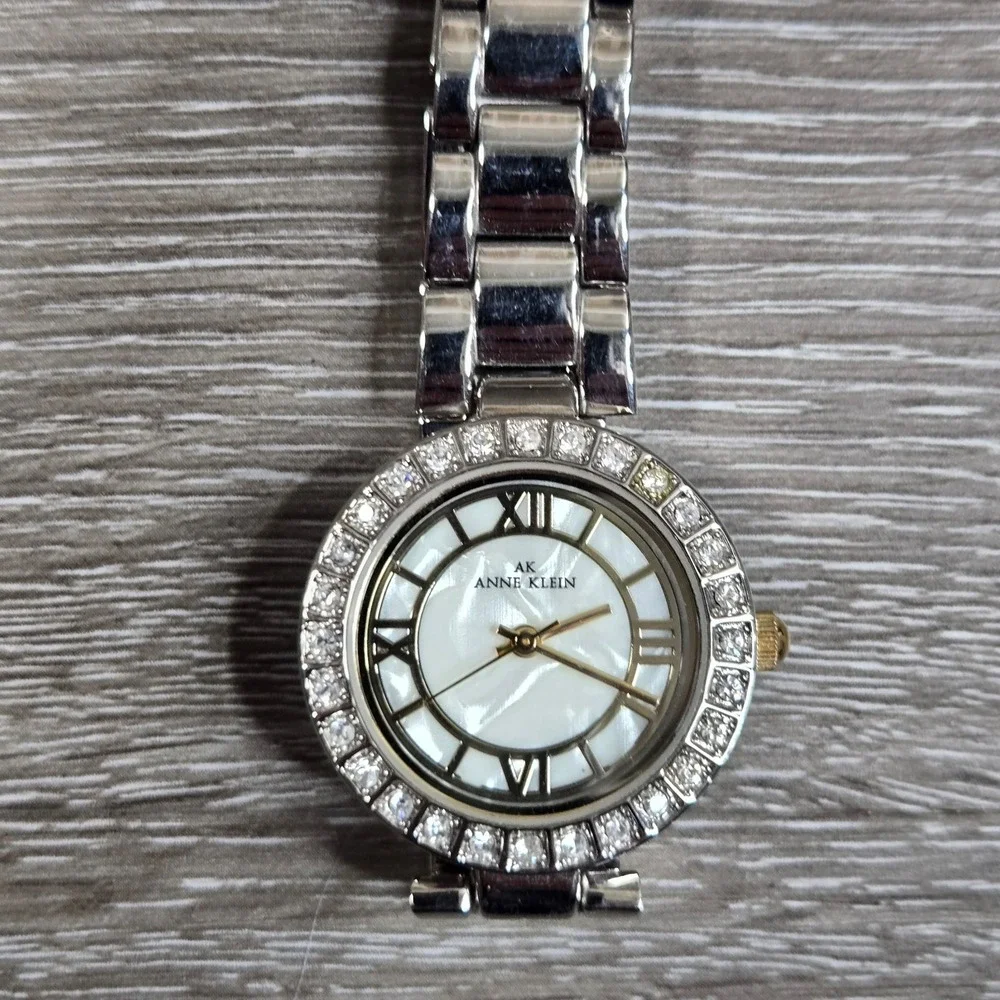 Anne Klein Women's Mother Of Pearl Women's Quartz Watch10/8671 silver tone S5.5